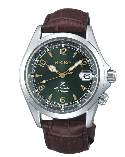 Seiko wristwatch with a green dial and brown leather strap.