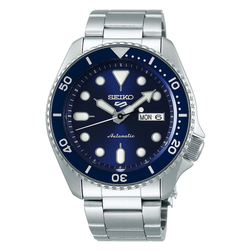 Seiko 5 Sports automatic dive watch with a blue dial and stainless steel bracelet.