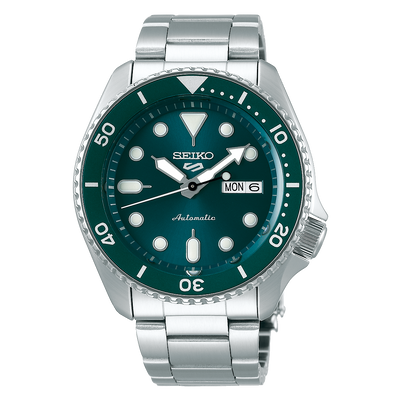 Seiko 5 Sports automatic dive watch with a green dial and stainless steel bracelet.