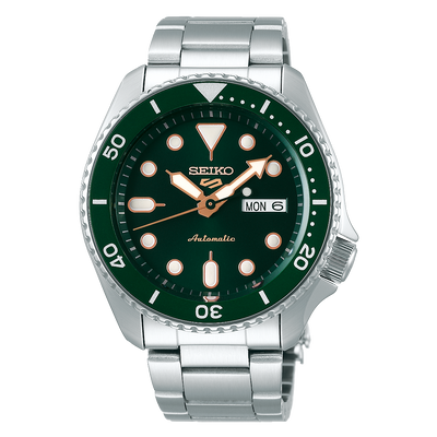 Seiko automatic dive watch with a green dial and stainless steel bracelet.