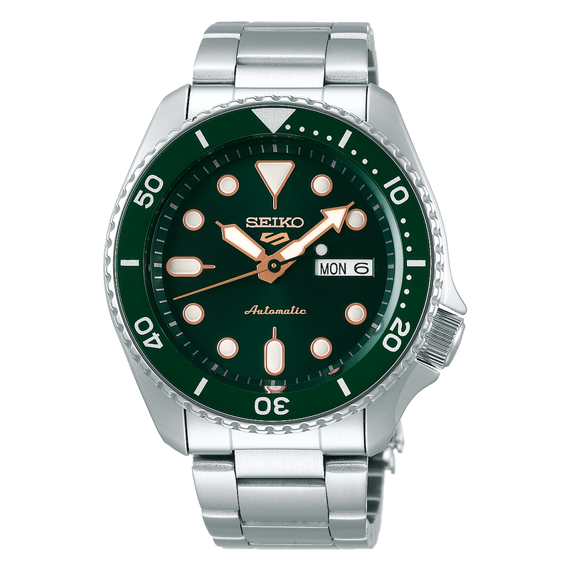 Seiko automatic dive watch with a green dial and stainless steel bracelet.