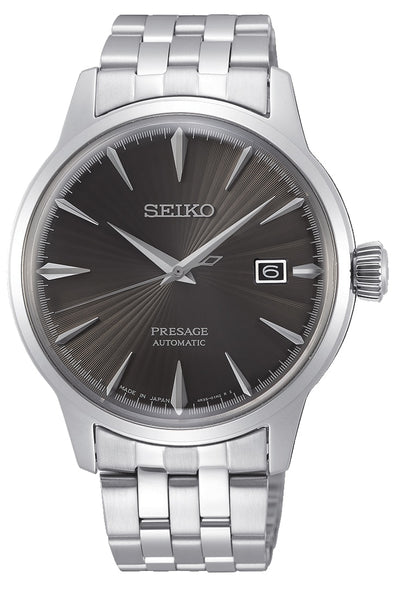 Seiko Presage automatic wristwatch with a dark dial and stainless steel bracelet.