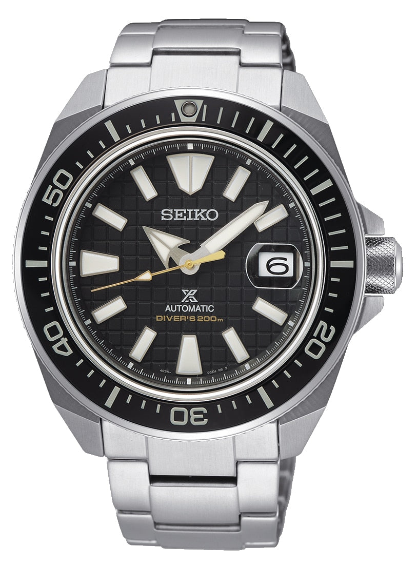 Stainless steel Seiko automatic dive watch with a black dial and rotating bezel.