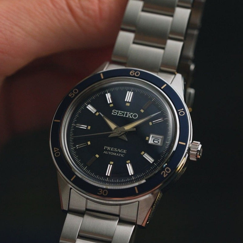 Seiko Presage automatic wristwatch with a blue dial and metal bracelet.