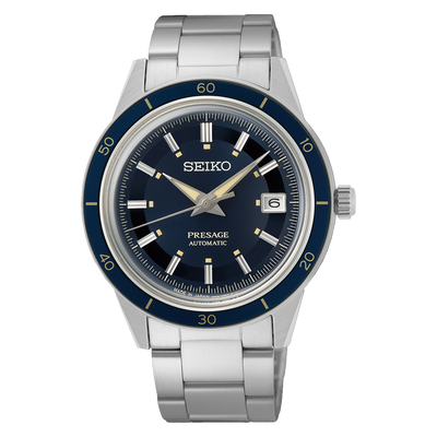 Seiko Presage wristwatch with a blue dial and stainless steel bracelet.