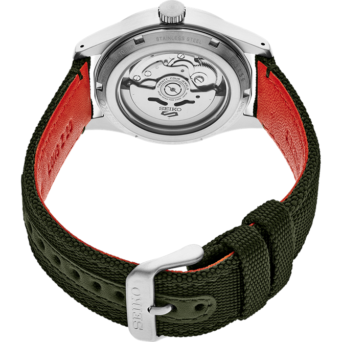 Wristwatch with a green fabric strap and visible mechanical movement through the transparent case back.