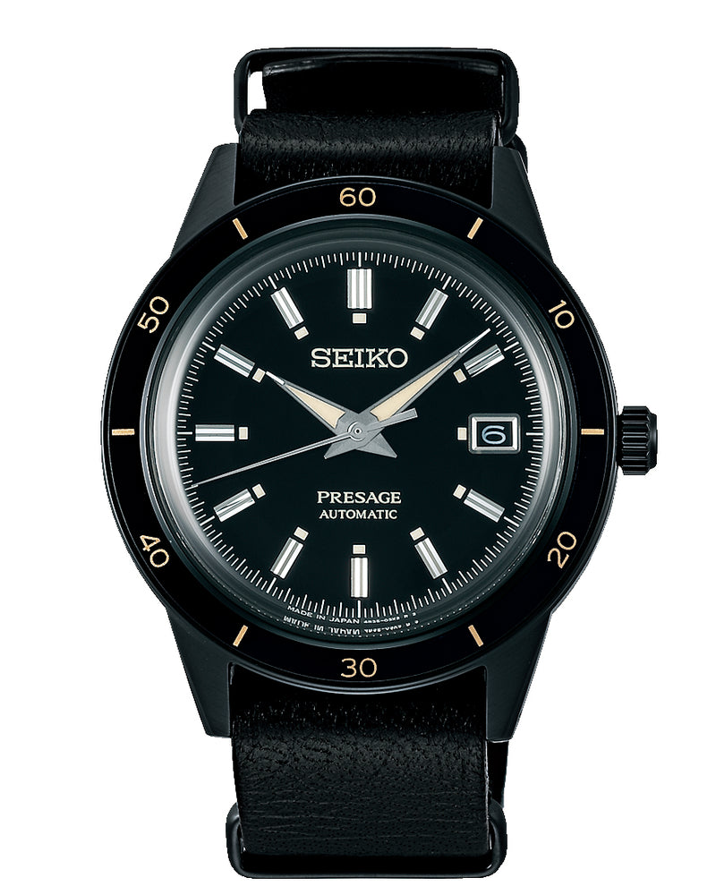 Black Seiko Presage automatic wristwatch with a leather strap.