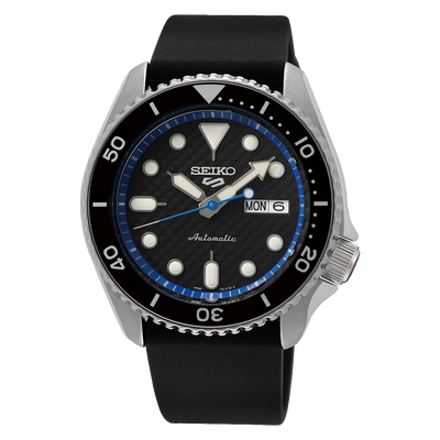 Seiko automatic dive watch with a black bezel and blue accent on the dial.