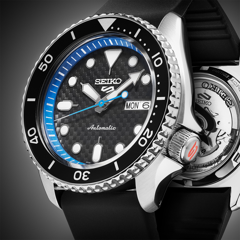 Seiko 5 Sports automatic dive watch with a black bezel and blue inner ring.