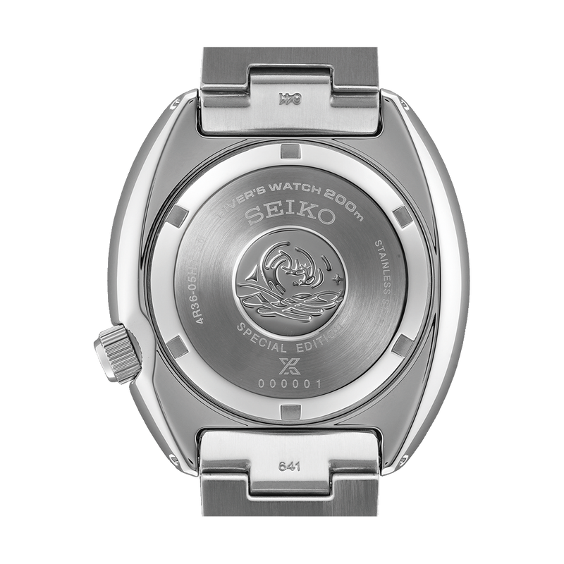 Back of a Seiko wristwatch case displaying the brand logo and model information.