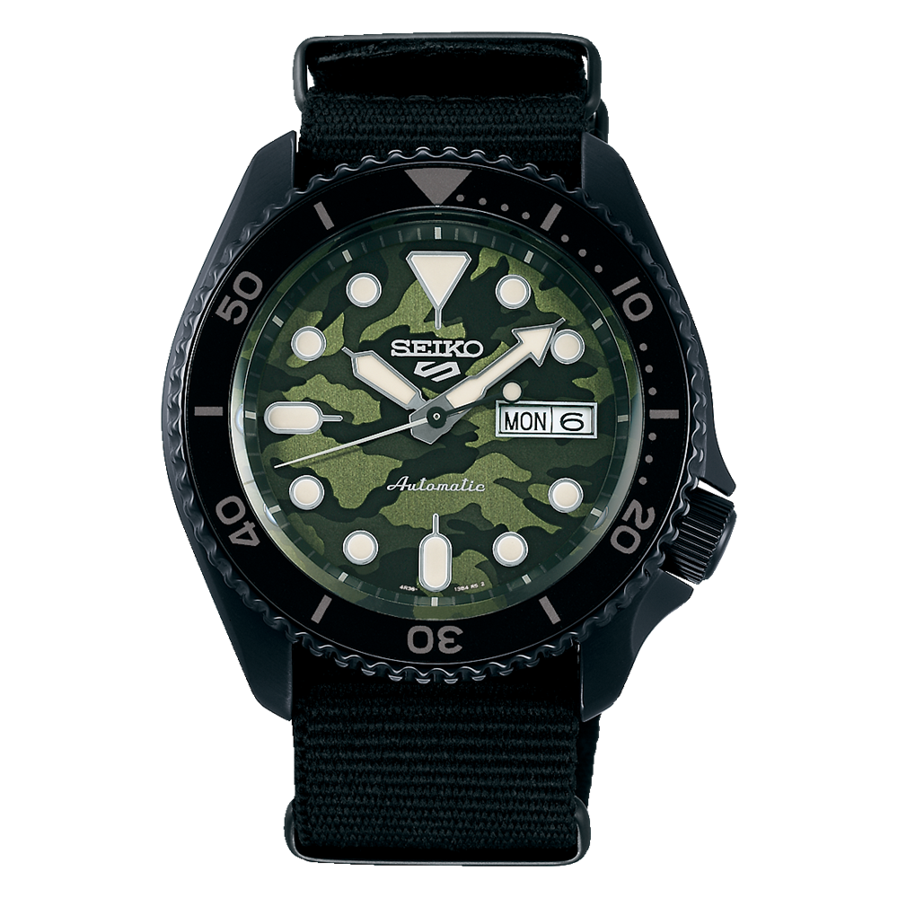 Seiko 5 Sports automatic dive watch with a green camouflage dial and black case.