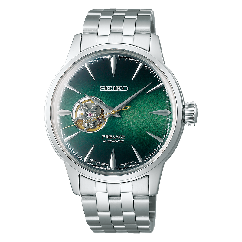 Seiko Presage automatic wristwatch with a green dial and silver metal bracelet.