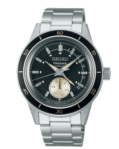 Seiko Presage wristwatch with a black dial and stainless steel bracelet.