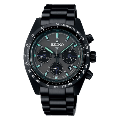 Black Seiko chronograph wristwatch with teal accents on the dial.