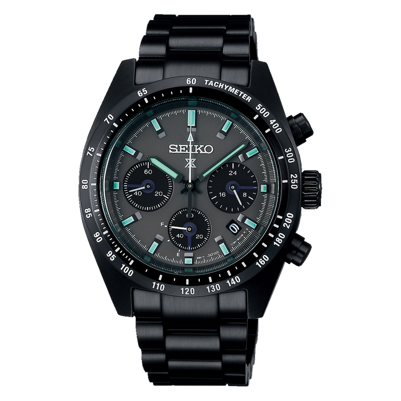 Black Seiko chronograph wristwatch with teal accents on the dial.