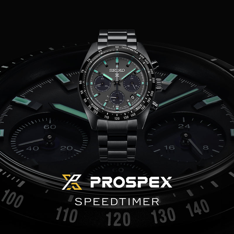 Black Seiko Prospex Speedtimer chronograph watch with luminous green accents.