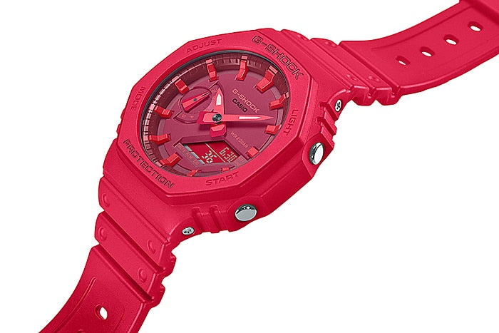 Bright red sports wristwatch with an analog face and chunky design.