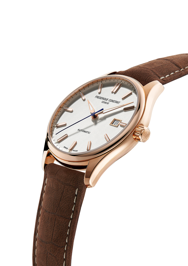 Elegant wristwatch with a rose gold case and brown leather strap.