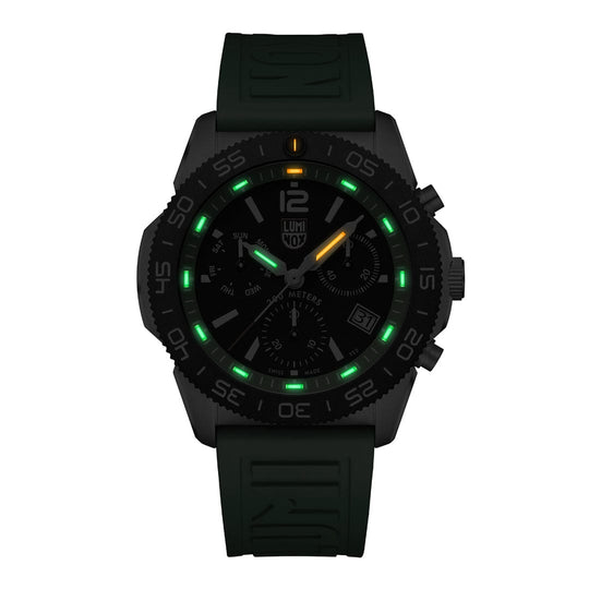 Black sports watch with glowing green and yellow markers on the dial.