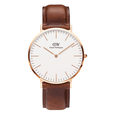 Elegant wristwatch with a brown leather strap and rose gold-toned case.
