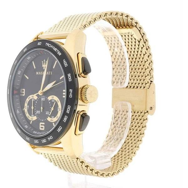 Gold-toned luxury wristwatch with a black dial and mesh metal band.