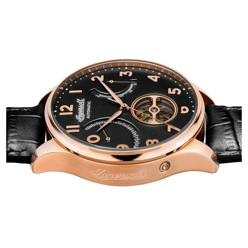 Luxury wristwatch with a black dial and rose gold case.