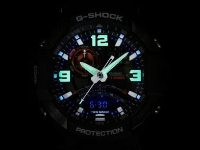 G-Shock watch face with illuminated analog and digital displays.