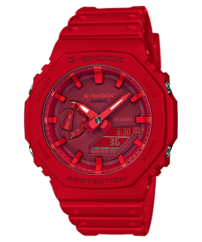 Red G-Shock digital wristwatch with analog hands and a chunky design.